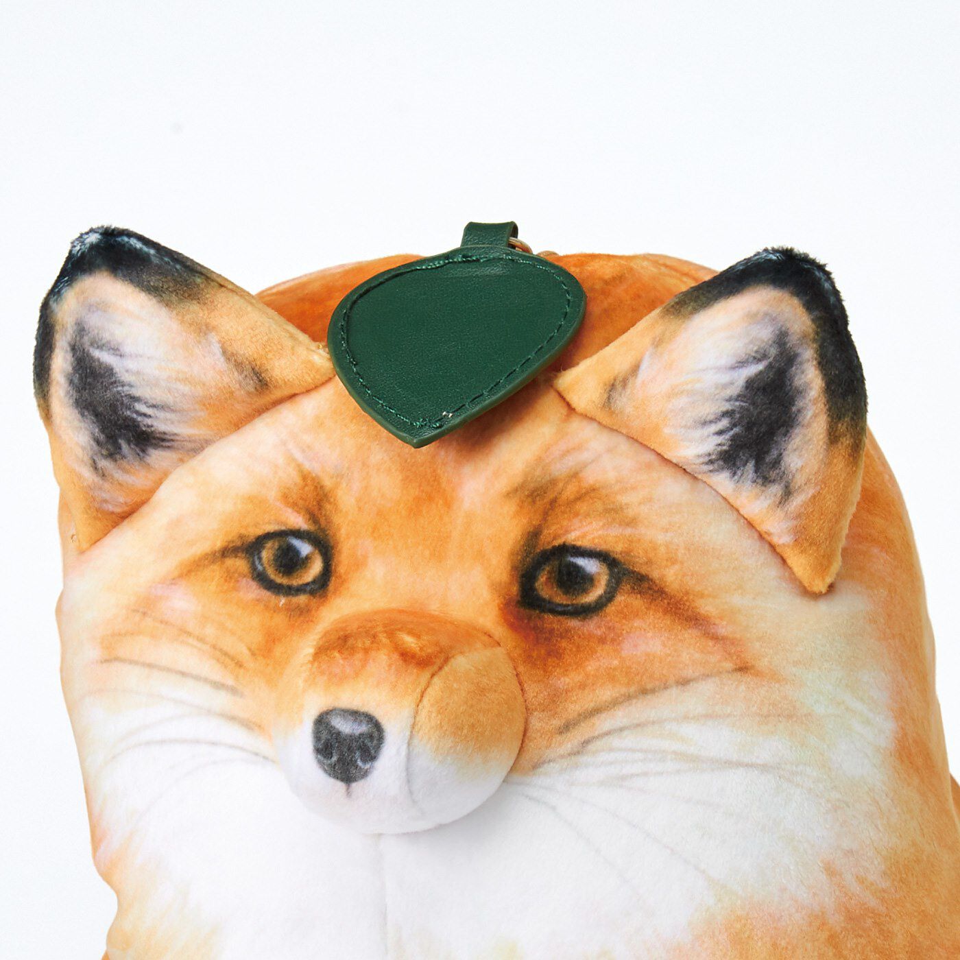 Real Stock|YOU+MORE!　キタキツネが化ける リバーシブルクッション|葉っぱのスライダーを頭まで持ってくると......