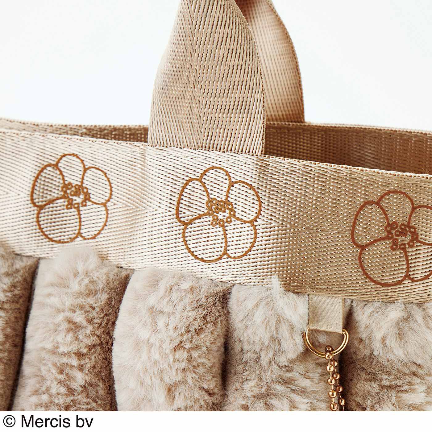 Real Stock|ミッフィーサークル　ふわふわの肌ざわり　大人色２-wayファーバッグ|テープ部分にはブルーナさんが描いたお花をプリント。