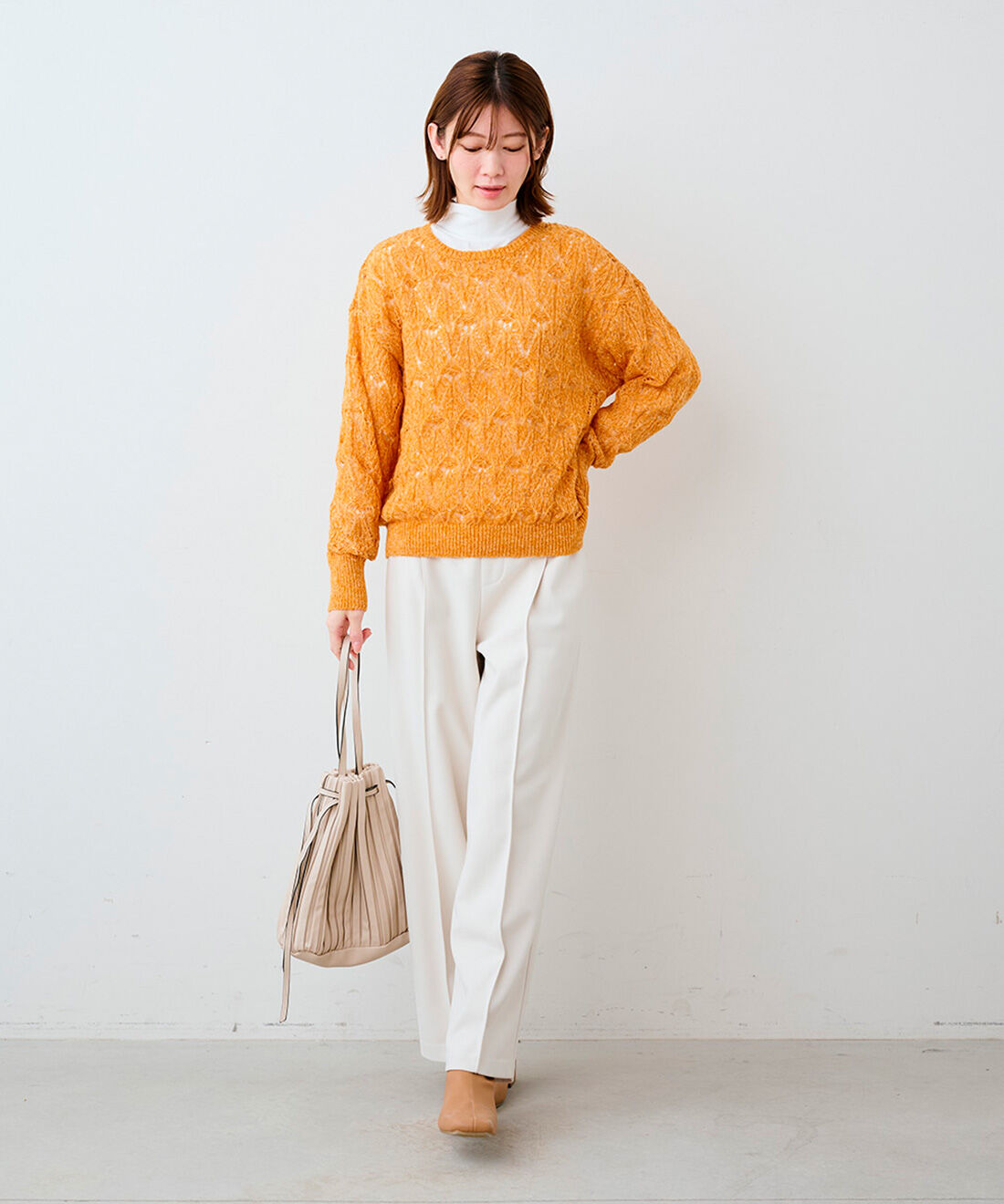 DRECO by IEDIT|【3～10日でお届け】IEDIT[イディット]　ハイネックカットソーとデザイン柄の透かし編みニットセット〈イエローオレンジ〉|モデル身長：165cm　着用サイズ：M