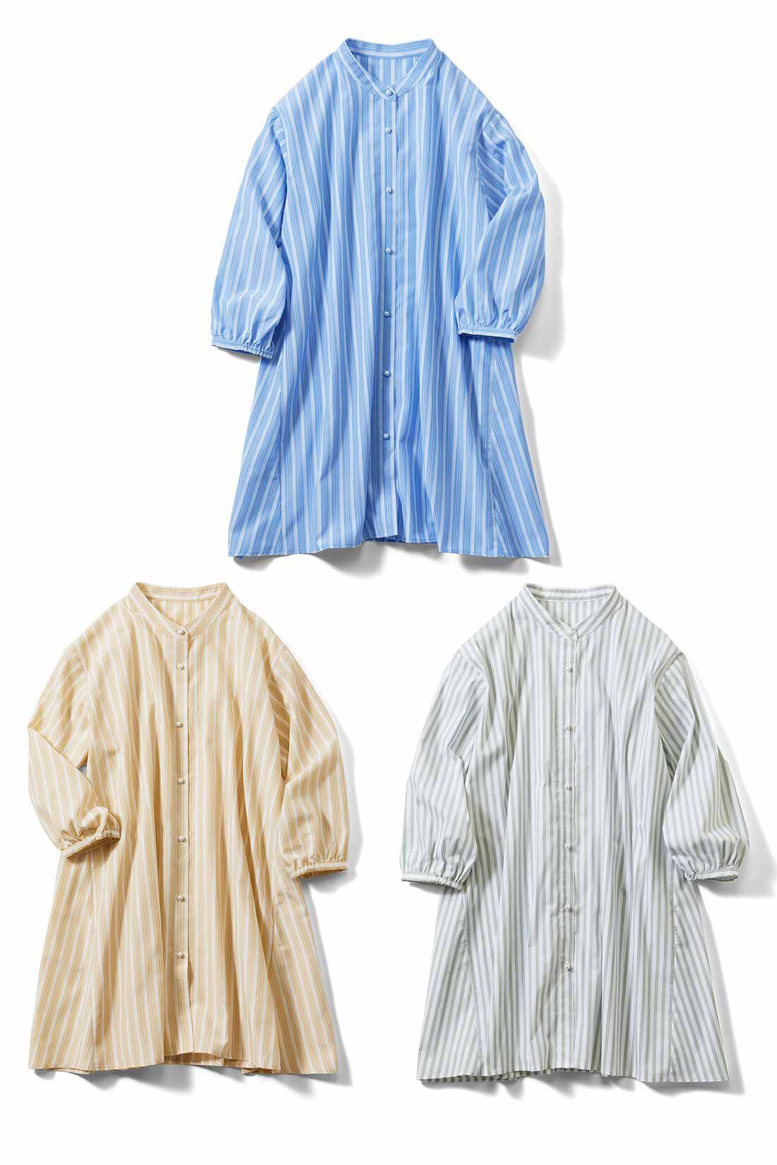 Live in  comfort|リブ イン コンフォート 後ろティアードで体形カバーも華やぎもかなえる パールボタンのストライプチュニックの会