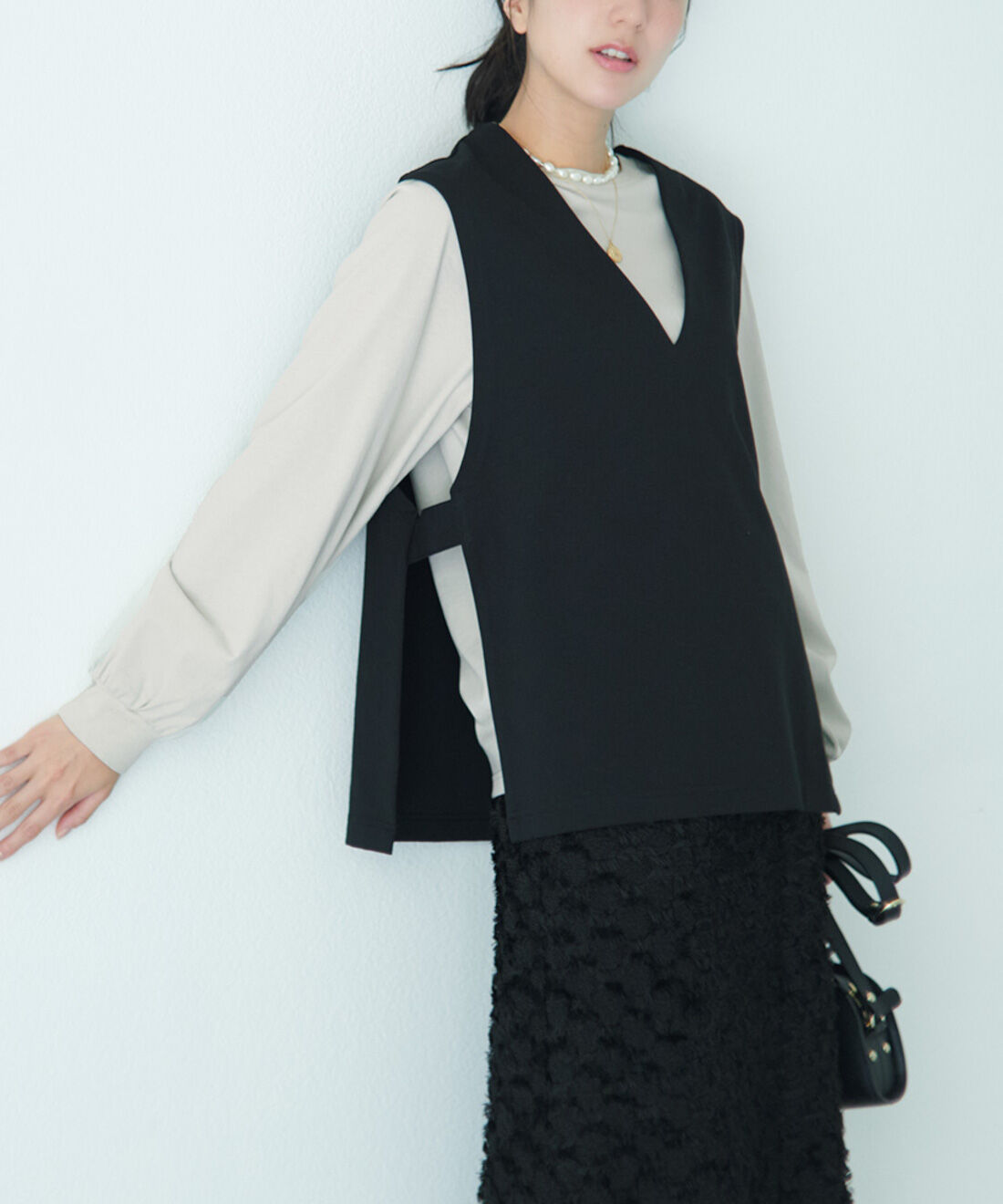 Live in  comfort| リブ　イン　コンフォート　ぐいーんと伸びる　軽やかさが素敵なフリンジスカート〈ブラック〉