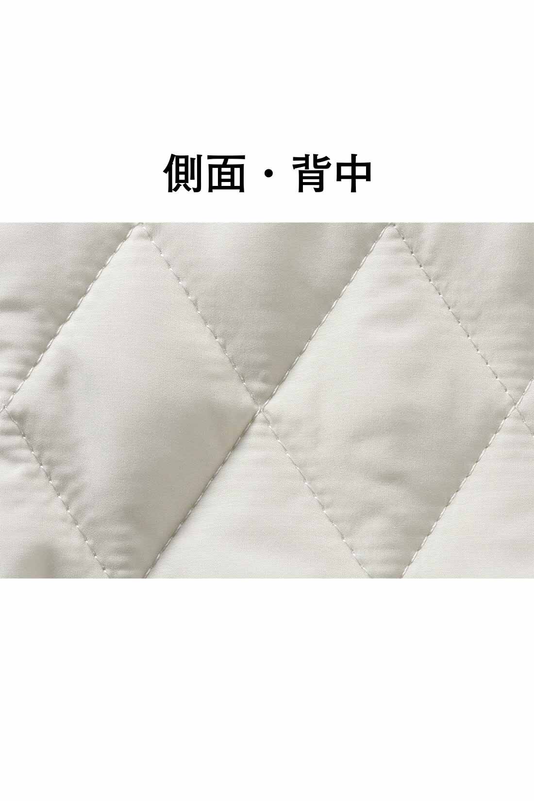 Live in  comfort|リブ イン コンフォート キルティングと裏起毛の異素材遣いチュニック|前身ごろは裏起毛素材、側面から背中をキルティング生地で切り替えて、あったかさも着映え感もアップ。