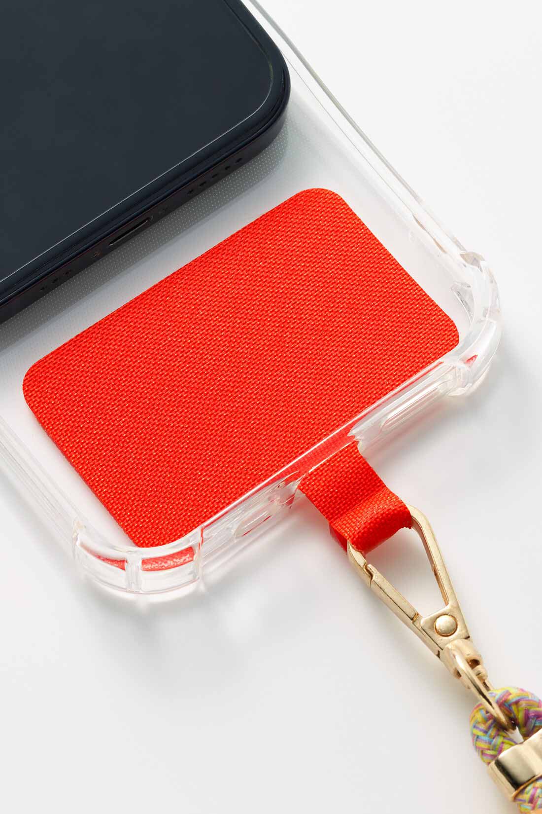 Live in  comfort|リブ イン コンフォート 手ぶらでらくちん！ アクセサリー感覚で華やかな 斜めがけスマホショルダーストラップ〈オレンジ〉|ホルダーをケースの内側に入れて挟み込むだけ。