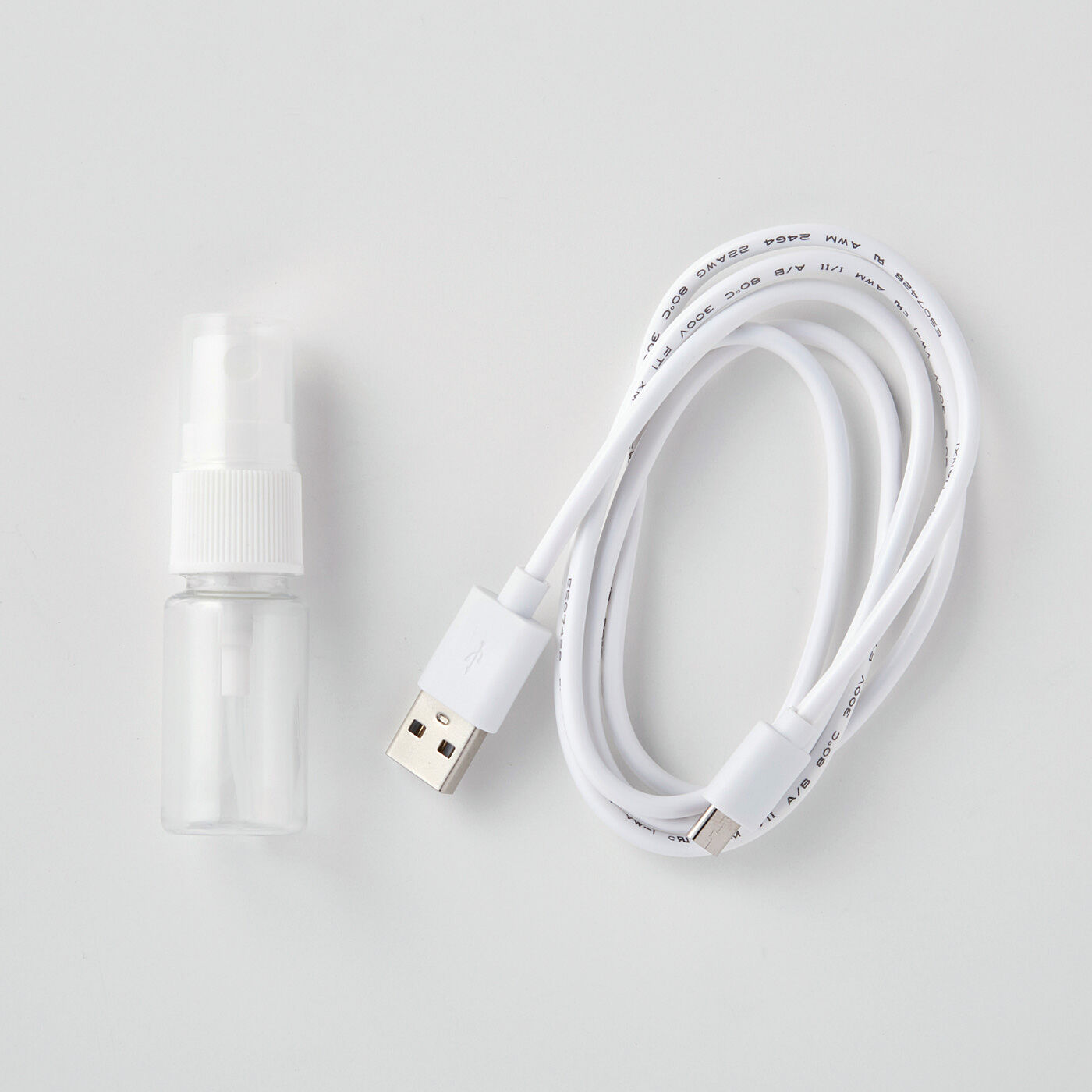 flufeel|気になるところに深く広くアプローチ　巻けるEMSベルトネクサ|充電用USBケーブルとアトマイザー付き。