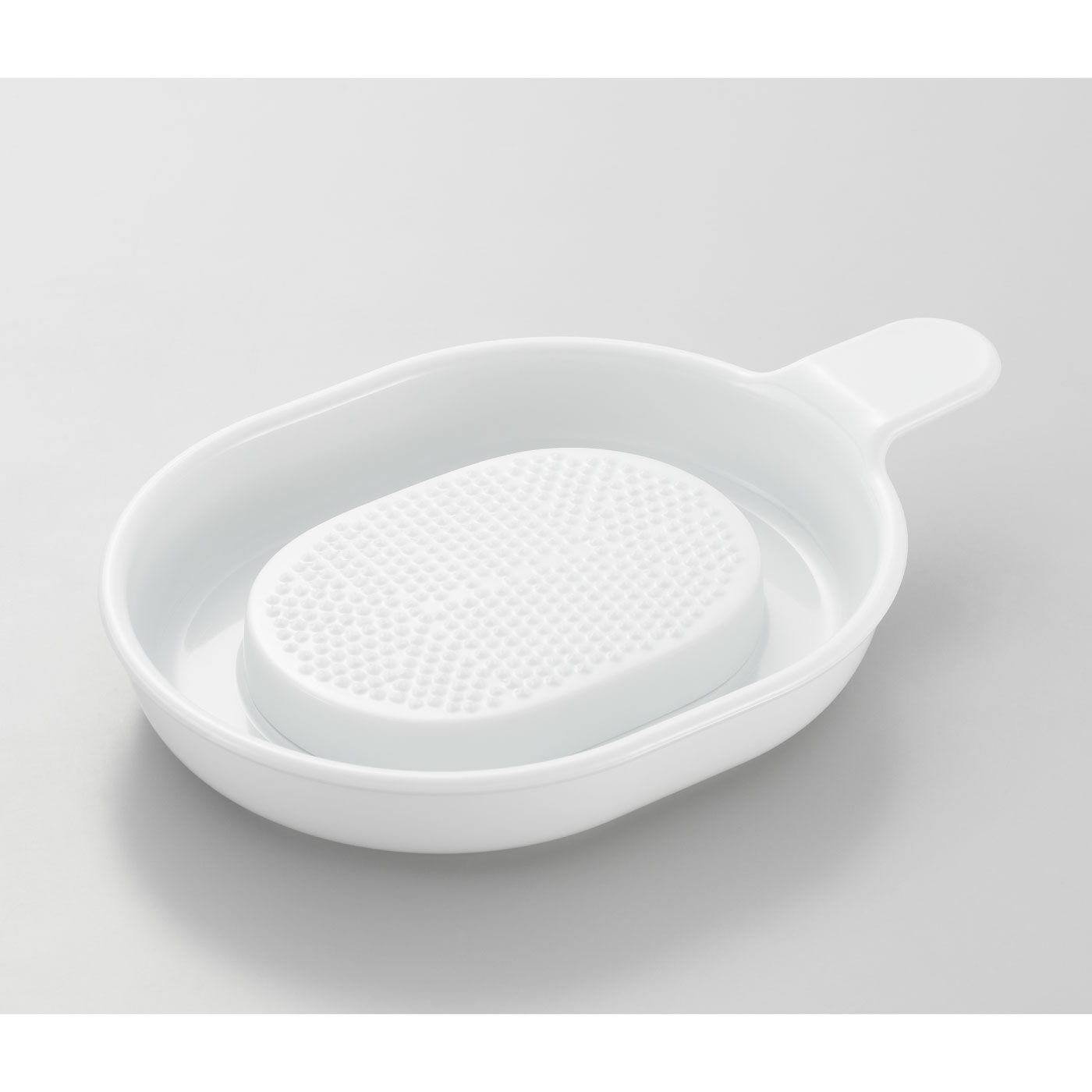 がっちり安定しておろしがラクラク セラミックおろし器【送料: 450円+税】