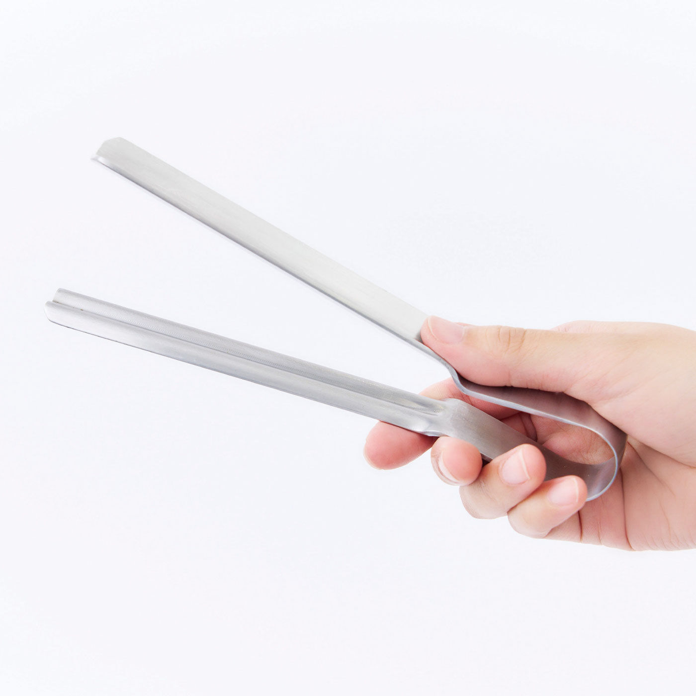 無駄なくスッキリしぼり出せるトング EAトCO SHIBOLU【送料: 450円+税】